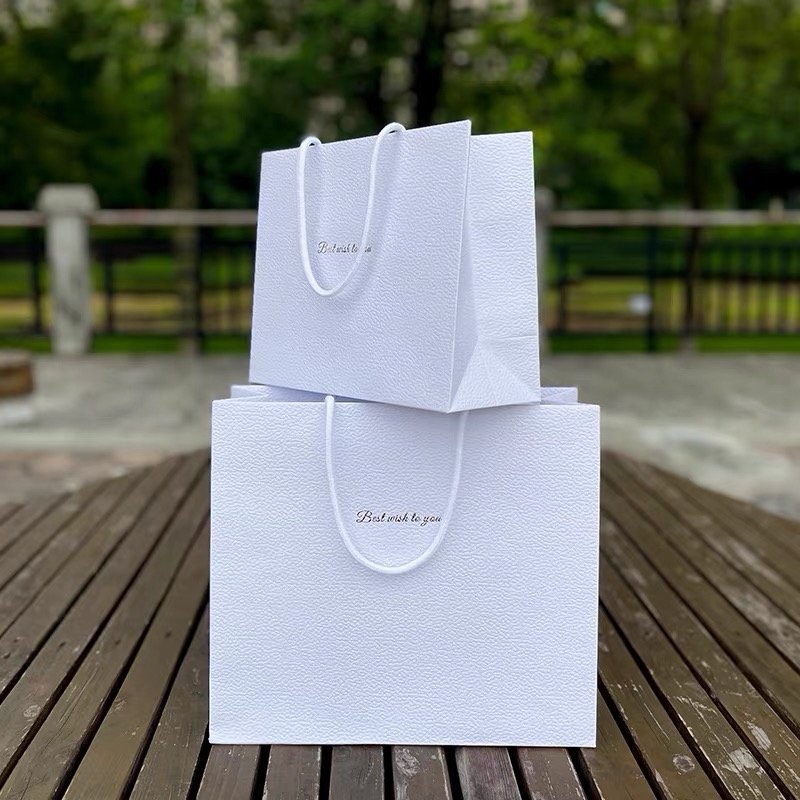 A stylish gift bag with vibrant colors and elegant design, perfect for presenting gifts.